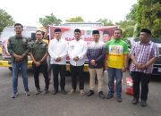 Bupati Luwu Lepas Penyaluran Bansos Anggota DPR RI Capt Ubas